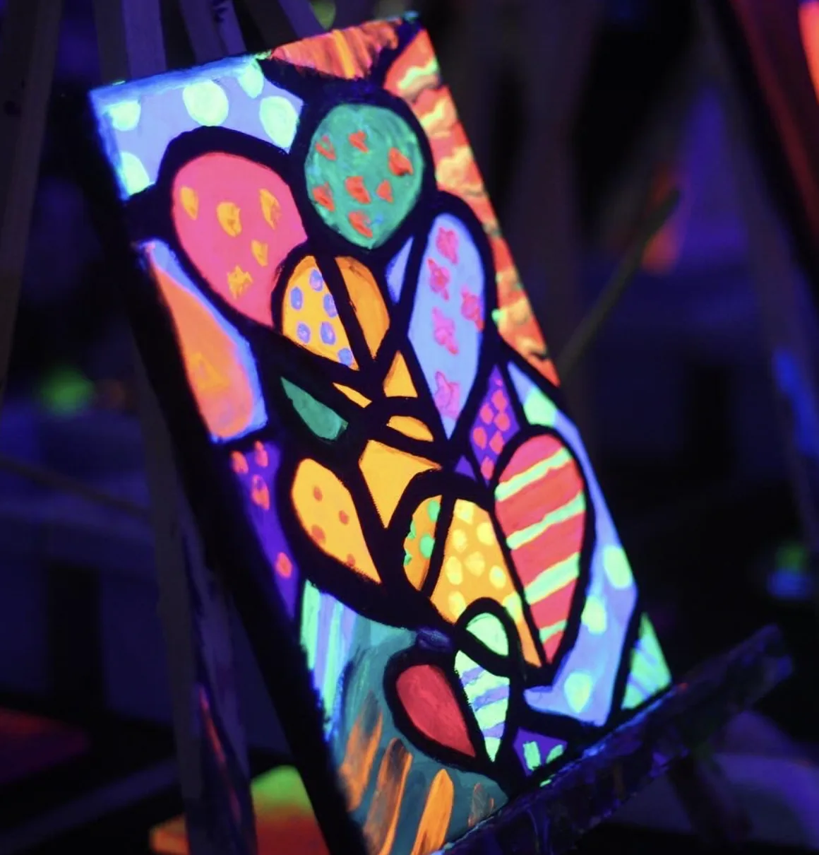 Vibrant artwork from a Tropikal silent painting experience